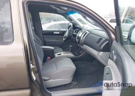 2015 Toyota Tacoma Base V6 z USA, uszkodzony, nr VIN 3TMLU4EN1FM201554